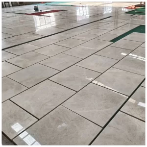 Polished Taj Mahal quartzite tiles with warm golden veining floor layout