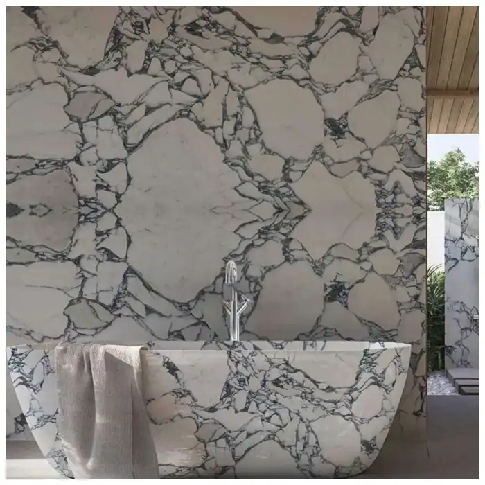 Bookmatched-Arabescato-Corchia-consecutive-marble-faces-arranged-in-a-full-height-feature-wall-layout Bookmatched-Arabescato-Corchia-consecutive-marble-faces-arranged-in-a-full-height-feature-wall-layout